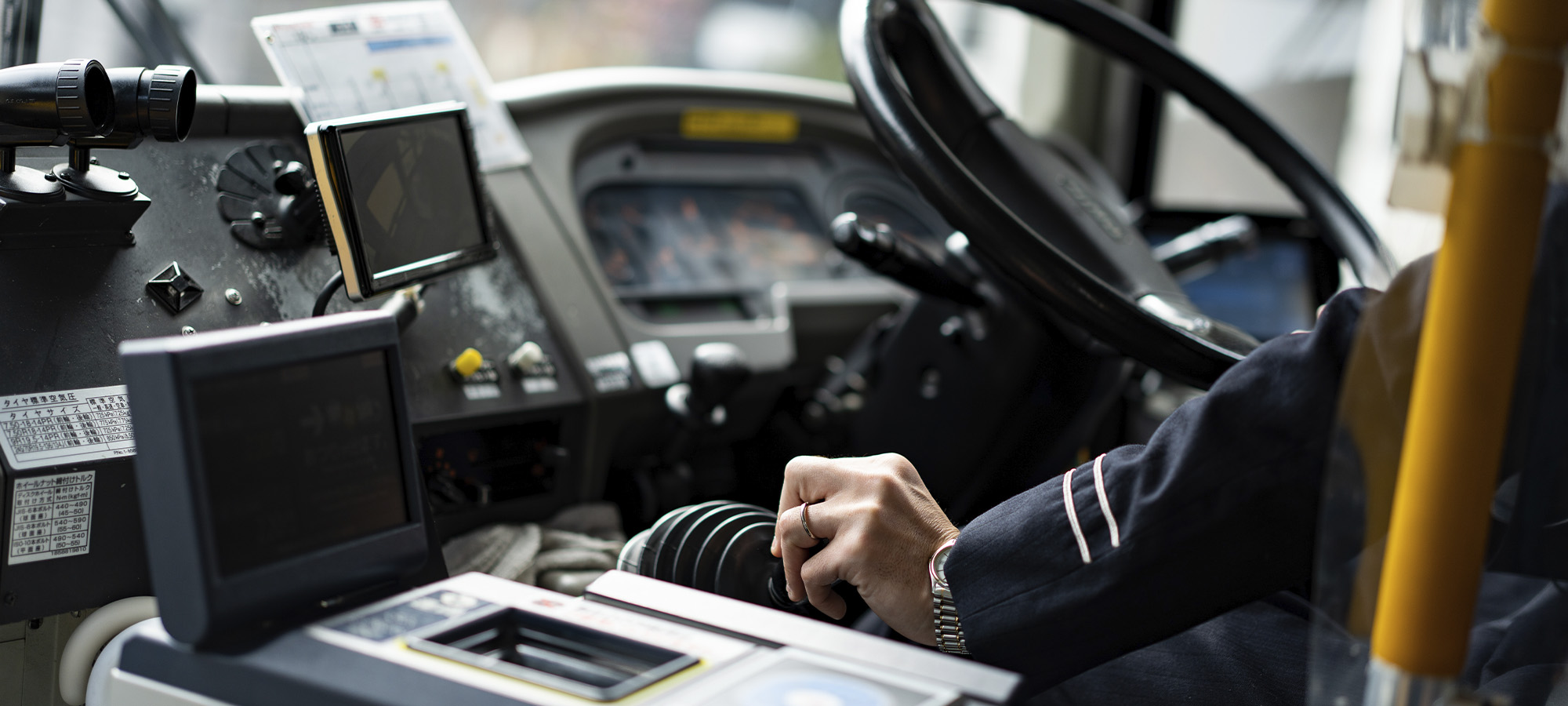 transit-bus-driver-operating-bus-controls